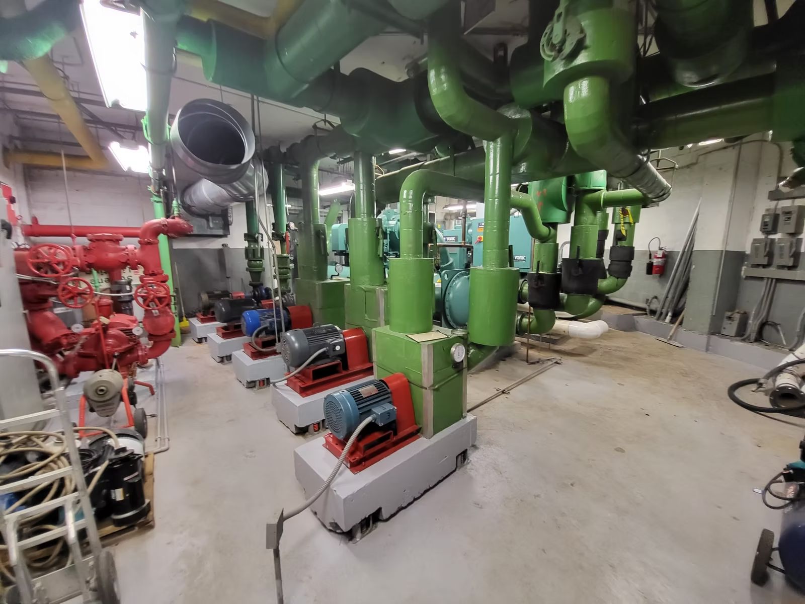 Condominium mechanical room with chillers, pumps and fire pump equipment